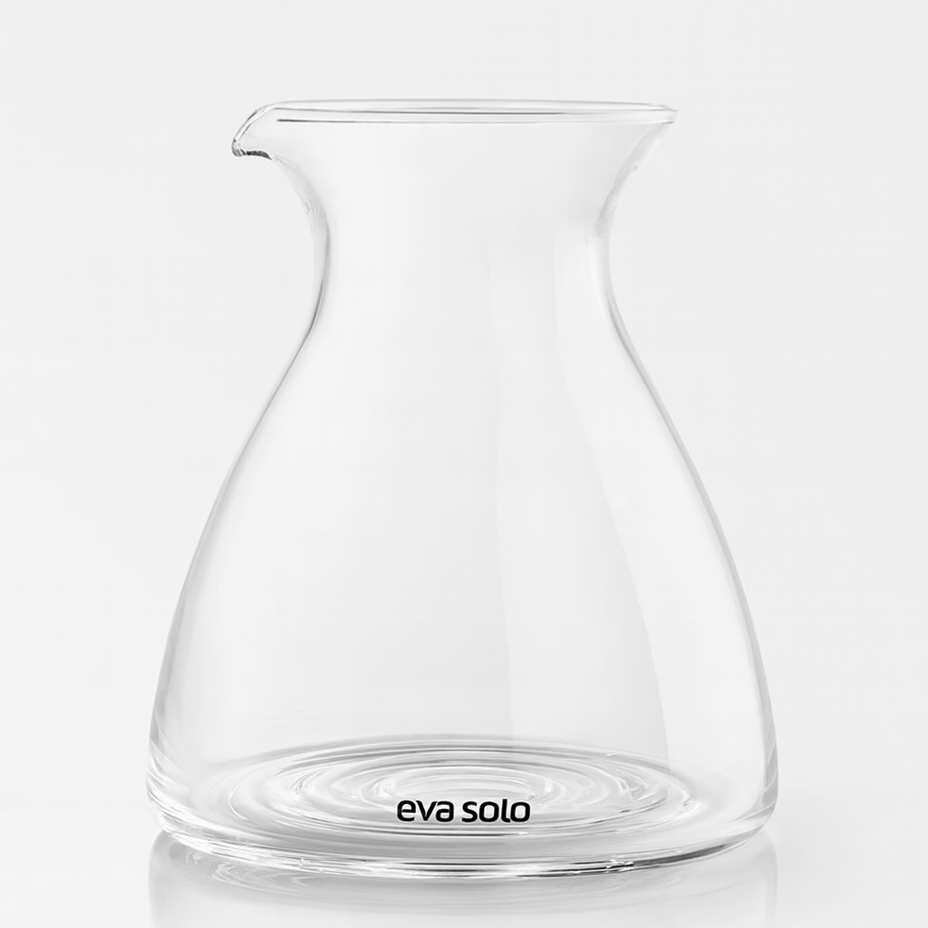 Clear glass carafe with 'eva solo' branding on a white background